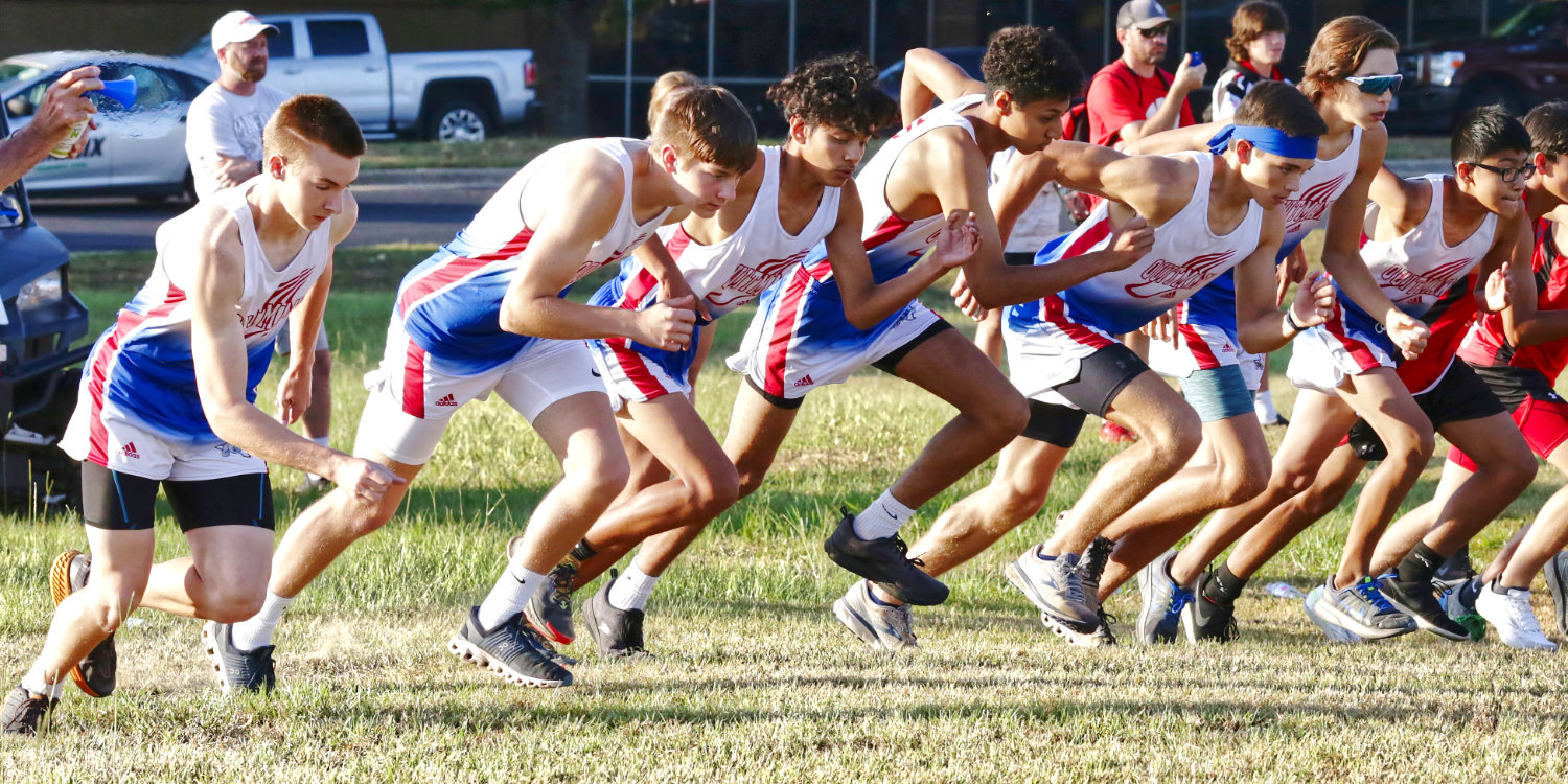 The starting horn disrupts the morning air as the Quitman boys cross-county team takes their first steps on the way to a district championship.